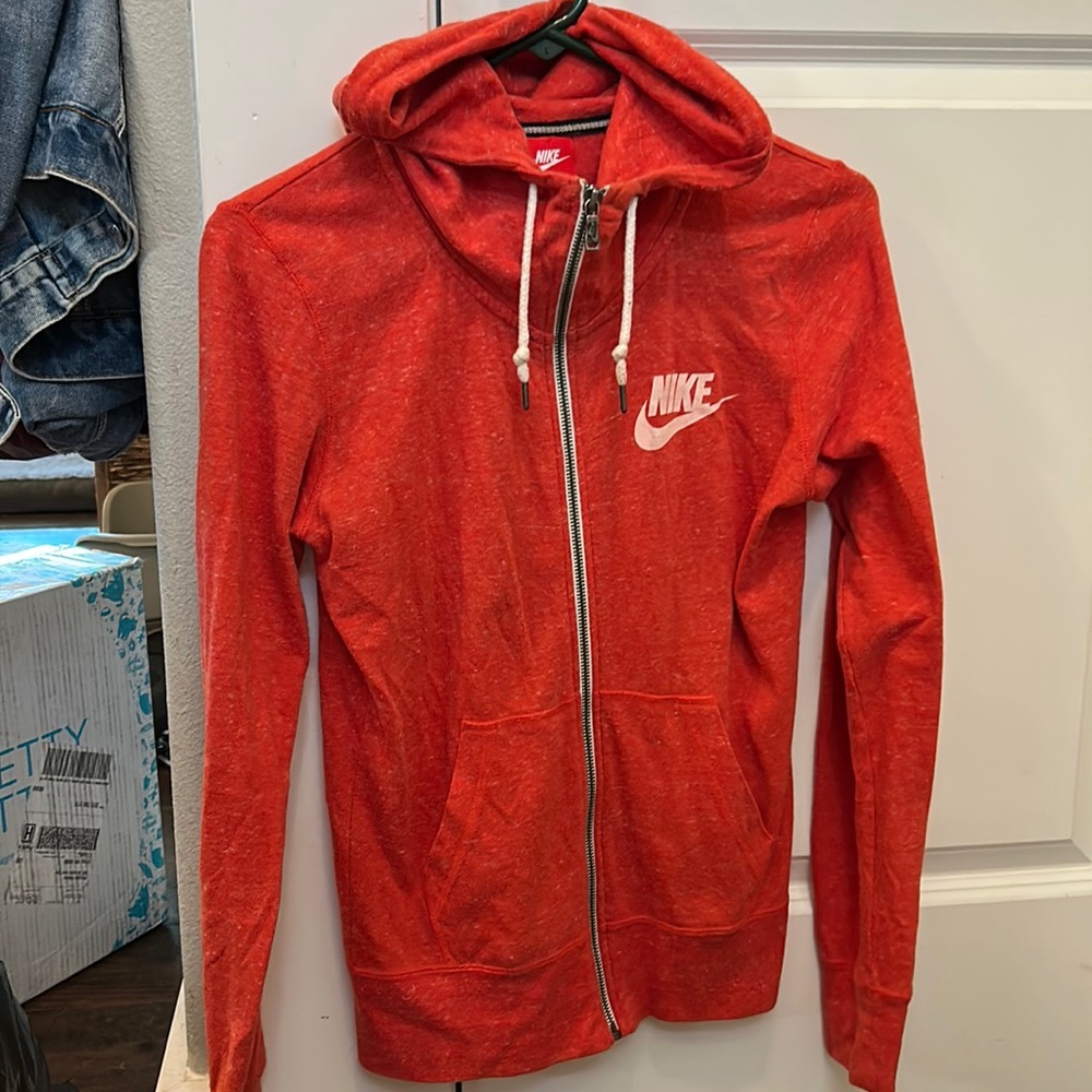 Salmon colored Nike jacket zip up